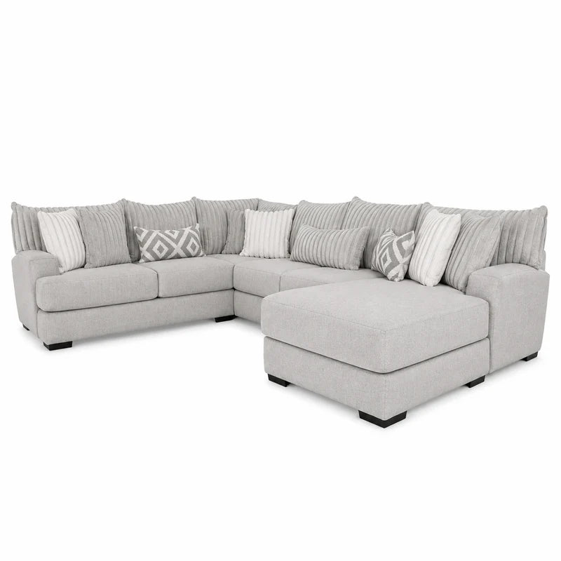 FREE Armless Chair & Ottoman with purchase of the Mondo Tweed 3 Pc Sectional