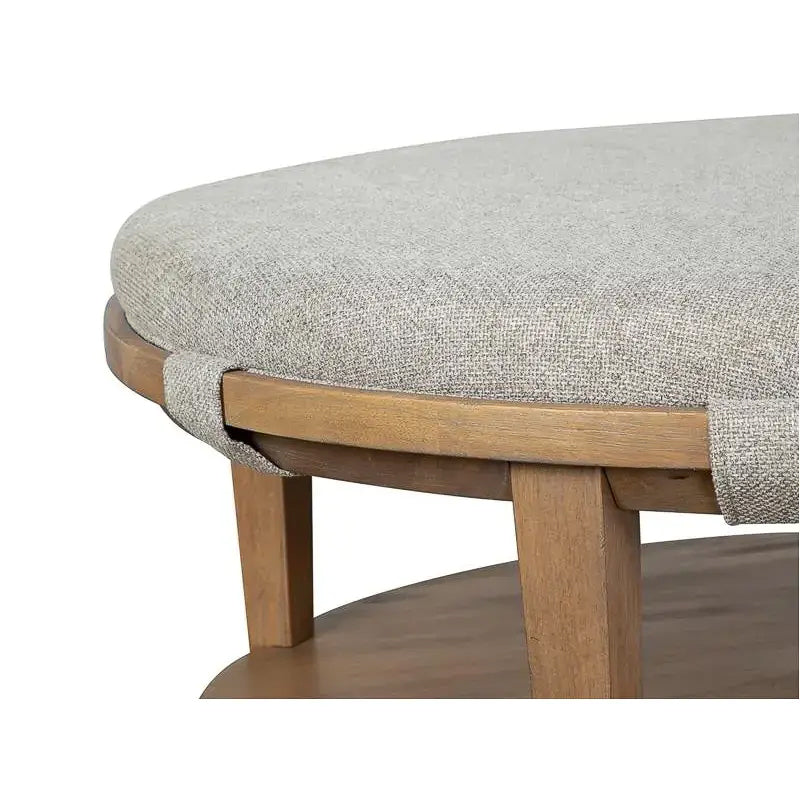 Lindon Round Cocktail Table w/ Grey Upholstery and Casters